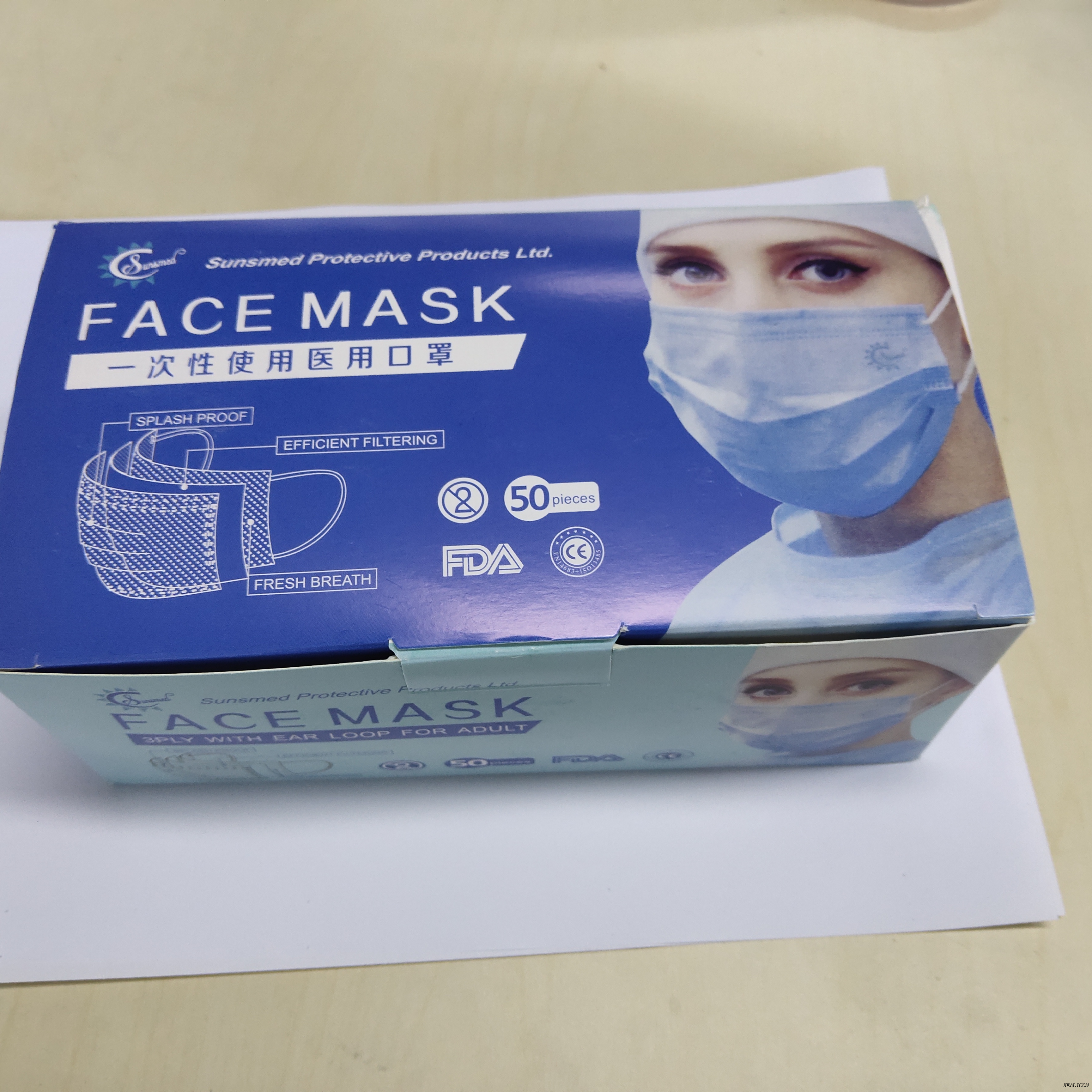 Masque facial non tissé jetable chirurgical médical en stock avec 3 couches d'oreille adulte hautement filtrée suspendue